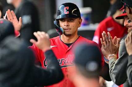 Aug 22, 2023; Cleveland, Ohio, USA; Cleveland Guardians second baseman Andres Gimenez (0) celebrates after scoring during the fourth inning against the Los Angeles Dodgers at Progressive Field. Mandatory Credit: Ken Blaze-USA TODAY Sports