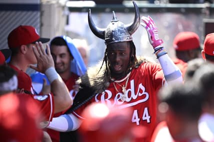 Aug 23, 2023; Anaheim, California, USA; Cincinnati Reds shortstop Elly De La Cruz (44) is congratulated in the dugout after hitting a three-run home run against the Los Angeles Angels during the fifth inning at Angel Stadium. Mandatory Credit: Orlando Ramirez-USA TODAY Sports
