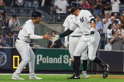 Aug 23, 2023; Bronx, New York, USA; New York Yankees right fielder Aaron Judge (99) celebrates his grand slam home run with center fielder Everson Pereira (80) during the second inning against the Washington Nationals at Yankee Stadium. Mandatory Credit: Vincent Carchietta-USA TODAY Sports