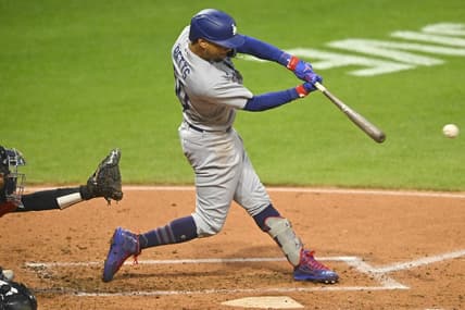 Aug 23, 2023; Cleveland, Ohio, USA; Los Angeles Dodgers right fielder Mookie Betts (50) singles in the second inning against the Cleveland Guardians at Progressive Field. Mandatory Credit: David Richard-USA TODAY Sports