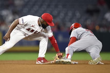 Aug 23, 2023; Anaheim, California, USA; Cincinnati Reds center fielder TJ Friedl (29) steals second base ahead of the tag by Los Angeles Angels second baseman Luis Rengifo (2) during the fifth inning at Angel Stadium. Mandatory Credit: Orlando Ramirez-USA TODAY Sports