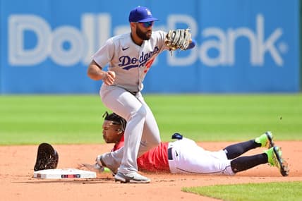 Aug 24, 2023; Cleveland, OH, USA; Cleveland Guardians third baseman Jose Ramirez (11) steals second as Los Angeles Dodgers second baseman Amed Rosario (31) catches the throw during the third inning at Progressive Field. Mandatory Credit: Ken Blaze-USA TODAY Sports