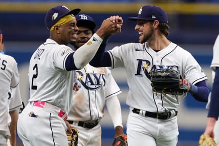 Aug 24, 2023; St. Petersburg, Florida, USA;  Tampa Bay Rays right fielder Josh Lowe (15) and first baseman Yandy Diaz (2) celebrate after beating the Colorado Rockies at Tropicana Field. Mandatory Credit: Nathan Ray Seebeck-USA TODAY Sports