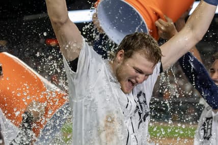 Aug 26, 2023; Detroit, Michigan, USA; Detroit Tigers center fielder Parker Meadows (22) gets showered with water after hitting a walk off three run home run to defeat the Houston Astros in the ninth inning at Comerica Park. Mandatory Credit: David Reginek-USA TODAY Sports
