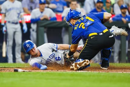 Aug 25, 2023; Seattle, Washington, USA; Seattle Mariners catcher Cal Raleigh (29) tags out Kansas City Royals center fielder Drew Waters (6) during the second inning at T-Mobile Park. Mandatory Credit: Joe Nicholson-USA TODAY Sports