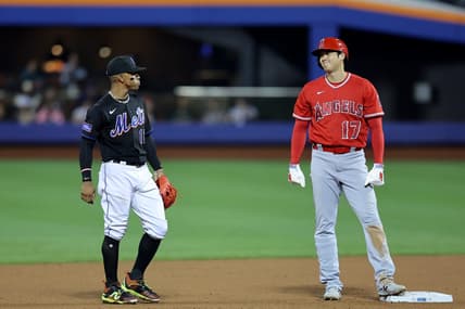 Aug 25, 2023; New York City, New York, USA; Los Angeles Angels designated hitter Shohei Ohtani (17) talks to New York Mets shortstop Francisco Lindor (12) at second base during the fifth inning at Citi Field. Mandatory Credit: Brad Penner-USA TODAY Sports