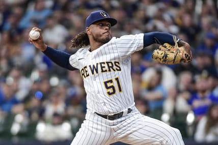Aug 26, 2023; Milwaukee, Wisconsin, USA; Milwaukee Brewers pitcher Freddy Peralta (51) pitches against the San Diego Padres in the first inning at American Family Field. Mandatory Credit: Benny Sieu-USA TODAY Sports