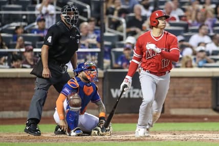 Aug 26, 2023; New York City, New York, USA;  Los Angeles Angels designated hitter Shohei Ohtani (17) hits an RBI triple in the second inning against the New York Mets at Citi Field. Mandatory Credit: Wendell Cruz-USA TODAY Sports