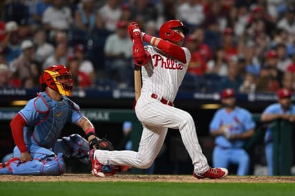 Aug 26, 2023; Philadelphia, Pennsylvania, USA;  Philadelphia Phillies second baseman Bryson Stott (5) hits a solo home run to center field during the fourth inning against the St. Louis Cardinals at Citizens Bank Park. Mandatory Credit: John Geliebter-USA TODAY Sports
