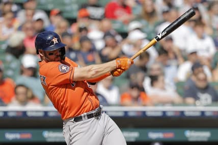 Aug 27, 2023; Detroit, Michigan, USA;  Houston Astros center fielder Chas McCormick (20) hits an RBI single in the eighth inning against the Detroit Tigers at Comerica Park. Mandatory Credit: Rick Osentoski-USA TODAY Sports