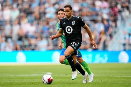 Aug 27, 2023; Saint Paul, Minnesota, USA; Minnesota United midfielder Hassani Dotson (31) dribbles during the second half against Seattle Sounders at Allianz Field. Mandatory Credit: Brace Hemmelgarn-USA TODAY Sports