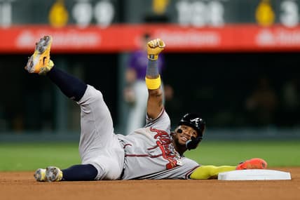 Aug 28, 2023; Denver, Colorado, USA; Atlanta Braves right fielder Ronald Acuna Jr. (13) reacts after stealing second in the seventh inning against the Colorado Rockies at Coors Field. Mandatory Credit: Isaiah J. Downing-USA TODAY Sports