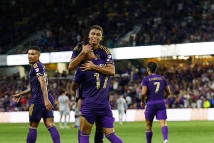 Aug 26, 2023; Orlando, Florida, USA; Orlando City SC midfielder Facundo Torres (17) and defender Rafael Santos (3) celebrate goal against St. Louis CITY SC in the second half at Exploria Stadium. Mandatory Credit: Morgan Tencza-USA TODAY Sports