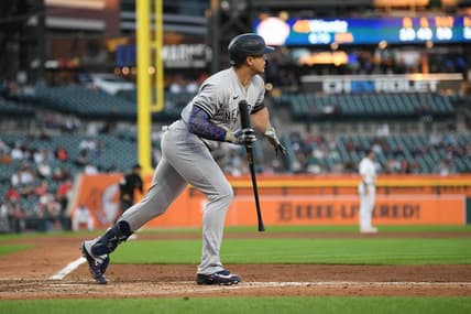 Aug 30, 2023; Detroit, Michigan, USA; New York Yankees designated hitter Giancarlo Stanton (27) watches his ball fly over the right center field wall for a home run against the Detroit Tigers in the fourth inning at Comerica Park. Mandatory Credit: Lon Horwedel-USA TODAY Sports