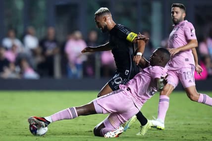 Aug 30, 2023; Fort Lauderdale, Florida, USA; Inter Miami defender Kamal Miller (31) slide tackles Nashville SC midfielder Hany Mukhtar (10) during the second half at DRV PNK Stadium. Mandatory Credit: Rich Storry-USA TODAY Sports