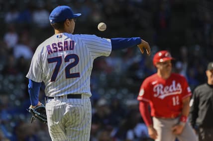 May 26, 2023; Chicago, Illinois, USA; Chicago Cubs starting pitcher Javier Assad (72) bumps the ball during the ninth inning against the Cincinnati Reds at Wrigley Field. Mandatory Credit: Matt Marton-USA TODAY Sports