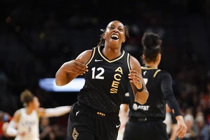 May 28, 2023; Las Vegas, Nevada, USA; Las Vegas Aces guard Chelsea Gray (12) reacts after scoring against the Minnesota Lynx during the first quarter at Michelob Ultra Arena. Mandatory Credit: Lucas Peltier-USA TODAY Sports
