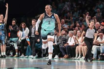 Aug 6, 2023; Brooklyn, New York, USA;  New York Liberty forward Kayla Thornton (5) celebrates after making a three point shot in the third quarter against the Las Vegas Aces at Barclays Center. Mandatory Credit: Wendell Cruz-USA TODAY Sports