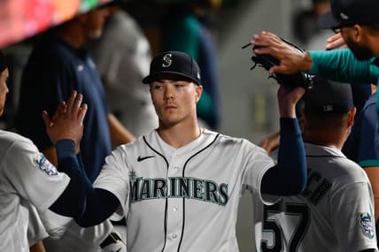 Aug 28, 2023; Seattle, Washington, USA; Seattle Mariners starting pitcher Bryan Woo (33) in the dugout during the sixth inning against the Oakland Athletics at T-Mobile Park. Mandatory Credit: Steven Bisig-USA TODAY Sports