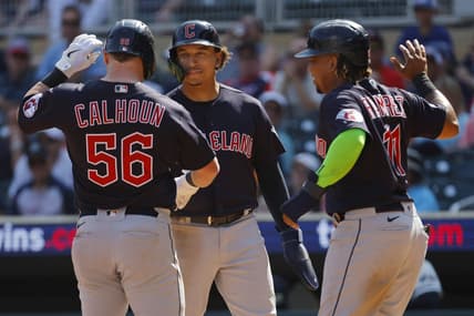 Aug 30, 2023; Minneapolis, Minnesota, USA; Cleveland Guardians first baseman Kole Calhoun (56) celebrates with catcher Bo Naylor (23) and third baseman Jose Ramirez (11) after hitting a three-run home run against the Minnesota Twins in the tenth inning at Target Field. Mandatory Credit: Bruce Kluckhohn-USA TODAY Sports
