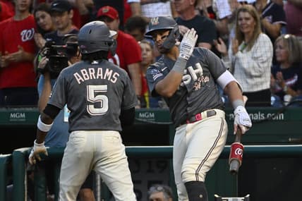 Sep 1, 2023; Washington, District of Columbia, USA; Washington Nationals shortstop CJ Abrams (5) is congratulated by designated hitter Joey Meneses (45) after hitting a solo home run against the Miami Marlins during the first inning at Nationals Park. Mandatory Credit: Brad Mills-USA TODAY Sports