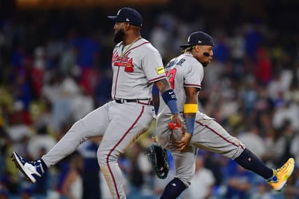 September 1, 2023; Los Angeles, California, USA; Atlanta Braves designated hitter Marcell Ozuna (20) and right fielder Ronald Acuna Jr. (13) celebrate the victory against the Los Angeles Dodgers at Dodger Stadium. Mandatory Credit: Gary A. Vasquez-USA TODAY Sports