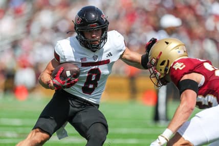 Sep 2, 2023; Chestnut Hill, Massachusetts, USA; Northern Illinois Huskies receiver Kacper Rutkiewicz (8) runs the ball during the first half against the Boston College Eagles at Alumni Stadium. Mandatory Credit: Paul Rutherford-USA TODAY Sports