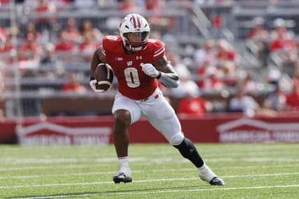 Sep 2, 2023; Madison, Wisconsin, USA;  Wisconsin Badgers running back Braelon Allen (0) rushes with the football during the second quarter against the Buffalo Bulls at Camp Randall Stadium. Mandatory Credit: Jeff Hanisch-USA TODAY Sports