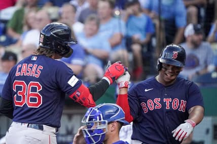Sep 2, 2023; Kansas City, Missouri, USA; Boston Red Sox first baseman Triston Casas (36) celebrates with third baseman Rafael Devers (11) after hitting a two run home run against the Kansas City Royals in the first inning at Kauffman Stadium. Mandatory Credit: Denny Medley-USA TODAY Sports