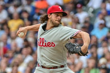 Sep 2, 2023; Milwaukee, Wisconsin, USA;  Philadelphia Phillies pitcher Aaron Nola (27) pitches in the first inning against the Milwaukee Brewers at American Family Field. Mandatory Credit: Benny Sieu-USA TODAY Sports