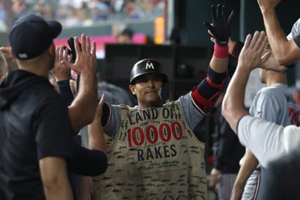 Sep 2, 2023; Arlington, Texas, USA; Minnesota Twins first baseman Donovan Solano (39) is congratulated by his teammates in the dugout after hitting a home run against the Texas Rangers in the third inning at Globe Life Field. Mandatory Credit: Tim Heitman-USA TODAY Sports