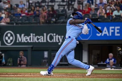 Sep 3, 2023; Arlington, Texas, USA; Texas Rangers right fielder Adolis Garcia (53) hits a walk off home run for the win over the Minnesota Twins during the ninth inning at Globe Life Field. Mandatory Credit: Jerome Miron-USA TODAY Sports
