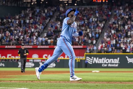 Sep 3, 2023; Arlington, Texas, USA; Texas Rangers right fielder Adolis Garcia (53) celebrates as he rounds the bases after he hits a walk off home run for the win over the Minnesota Twins during the ninth inning at Globe Life Field. Mandatory Credit: Jerome Miron-USA TODAY Sports