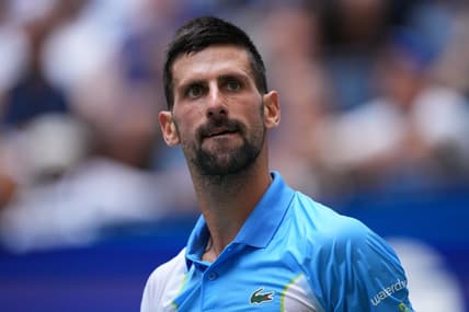 Sep 5, 2023; Flushing, NY, USA; Novak Djokovic of Serbia reacts after winning a game against Taylor Fritz of the United States on day nine of the 2023 U.S. Open tennis tournament at USTA Billie Jean King National Tennis Center. Mandatory Credit: Danielle Parhizkaran-USA TODAY Sports