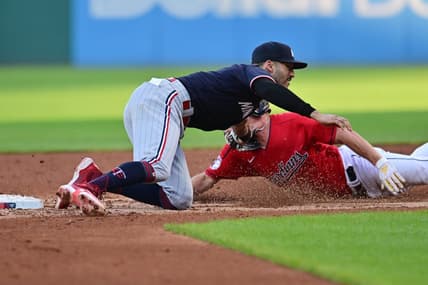 Sep 5, 2023; Cleveland, Ohio, USA; Cleveland Guardians center fielder Myles Straw (7) is caught stealing by Minnesota Twins shortstop Carlos Correa (4) during the third inning at Progressive Field. Mandatory Credit: Ken Blaze-USA TODAY Sports