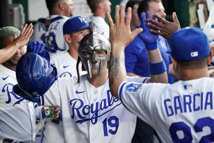 Sep 5, 2023; Kansas City, Missouri, USA; Kansas City Royals second baseman Michael Massey (19) is congratulated in the dugout after hitting a home run against the Chicago White Sox in the fourth inning at Kauffman Stadium. Mandatory Credit: Denny Medley-USA TODAY Sports