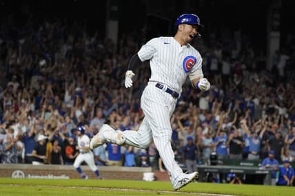 Sep 5, 2023; Chicago, Illinois, USA; Chicago Cubs right fielder Seiya Suzuki (27) hits a two-run home run against the San Francisco Giants during the seventh inning at Wrigley Field. Mandatory Credit: David Banks-USA TODAY Sports