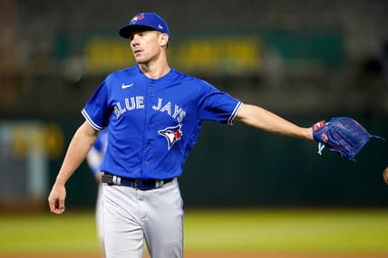 Sep 5, 2023; Oakland, California, USA; Toronto Blue Jays pitcher Chris Bassitt (40) is congratulated by teammates after the Blue Jays recorded the final out of the fifth inning against the Oakland Athletics at Oakland-Alameda County Coliseum. Mandatory Credit: Cary Edmondson-USA TODAY Sports