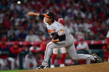 Sep 5, 2023; Anaheim, California, USA; Baltimore Orioles relief pitcher Shintaro Fujinami (14) throws against the Los Angeles Angels during the tenth inning at Angel Stadium. Mandatory Credit: Gary A. Vasquez-USA TODAY Sports