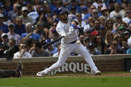 Sep 6, 2023; Chicago, Illinois, USA;  Chicago Cubs third baseman Nick Madrigal (1) hits an RBI single against the San Francisco Giants during the third inning at Wrigley Field. Mandatory Credit: Matt Marton-USA TODAY Sports
