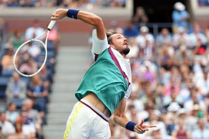 Sep 6, 2023; Flushing, NY, USA; Daniil Medvedev serves to Andrey Rublev on day ten of the 2023 U.S. Open tennis tournament at USTA Billie Jean King National Tennis Center. Mandatory Credit: Danielle Parhizkaran-USA TODAY Sports