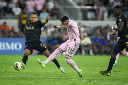 Sep 3, 2023; Los Angeles, California, USA; Inter Miami CF midfielder Facundo Far  as (11) moves the ball against LAFC defender Aaron Long (33) at BMO Stadium. Mandatory Credit: Kirby Lee-USA TODAY Sports