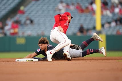 Sep 7, 2023; Anaheim, California, USA; Cleveland Guardians first baseman Josh Naylor (22) slides into second base to beat a throw to Los Angeles Angels second baseman Brandon Drury (23) in the first inning at Angel Stadium. Mandatory Credit: Kirby Lee-USA TODAY Sports