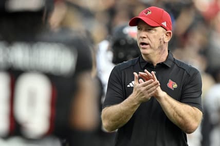 Sep 7, 2023; Louisville, Kentucky, USA; Louisville Cardinals head coach Jeff Brohm watches warmups before facing off against the Murray State Racers at L&N Federal Credit Union Stadium. Mandatory Credit: Jamie Rhodes-USA TODAY Sports