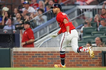 Sep 8, 2023; Atlanta, Georgia, USA; Atlanta Braves left fielder Eddie Rosario (8) hits a RBI single against the Pittsburgh Pirates in the third inning at Truist Park. Mandatory Credit: Brett Davis-USA TODAY Sports