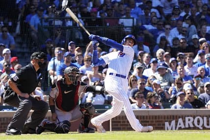 Sep 9, 2023; Chicago, Illinois, USA; Chicago Cubs first baseman Cody Bellinger (24) hits a RBI single against the Arizona Diamondbacks during the third inningat Wrigley Field. Mandatory Credit: David Banks-USA TODAY Sports