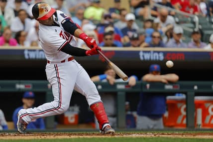 Sep 9, 2023; Minneapolis, Minnesota, USA; Minnesota Twins first baseman Donovan Solano (39) hits a two-run single against the New York Mets in the second inning at Target Field. Mandatory Credit: Bruce Kluckhohn-USA TODAY Sports