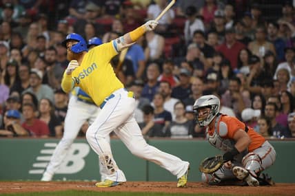 Sep 9, 2023; Boston, Massachusetts, USA;  Boston Red Sox designated hitter Justin Turner (2) hits a two run home run during the first inning against the Baltimore Orioles at Fenway Park. Mandatory Credit: Bob DeChiara-USA TODAY Sports
