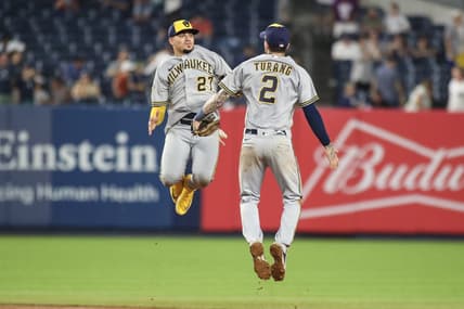 Sep 9, 2023; Bronx, New York, USA;  Milwaukee Brewers shortstop Willy Adames (27) and second baseman Brice Turang (2) celebrate after defeating the New York Yankees 9-2 at Yankee Stadium. Mandatory Credit: Wendell Cruz-USA TODAY Sports