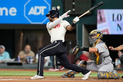 Sep 9, 2023; Arlington, Texas, USA; Texas Rangers left fielder Ezequiel Duran (20) singles against the Oakland Athletics during the second inning at Globe Life Field. Mandatory Credit: Jim Cowsert-USA TODAY Sports